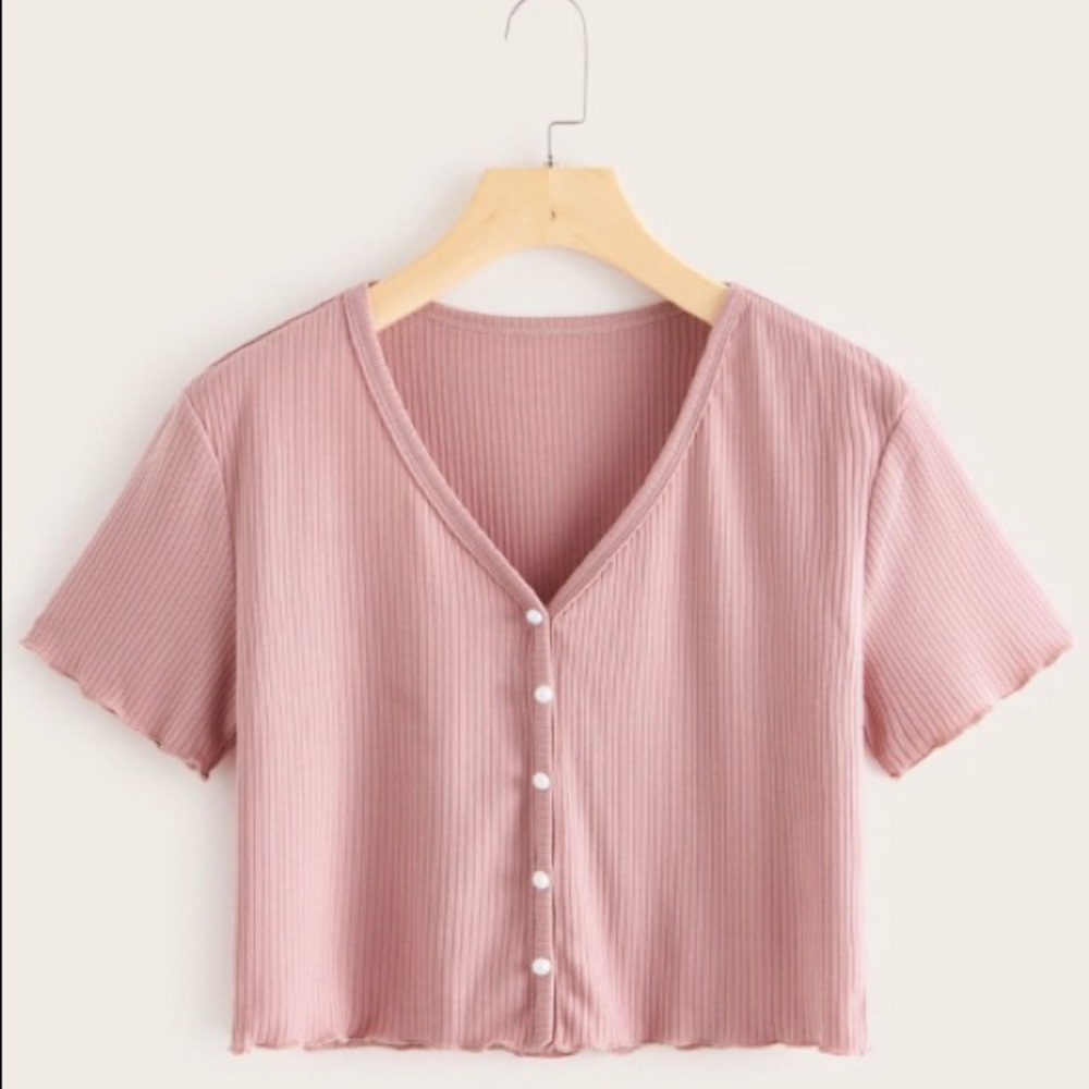 Cute girl’s pink crop top